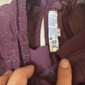 Purple sparkled top with ruffled sleeves